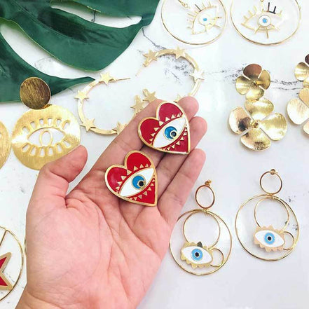 Exaggerated Heart Earrings with Retro Eye Design