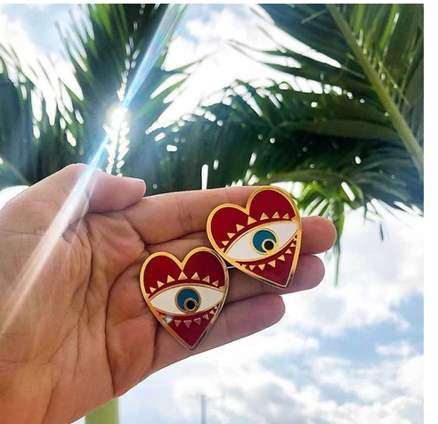 Exaggerated Heart Earrings with Retro Eye Design