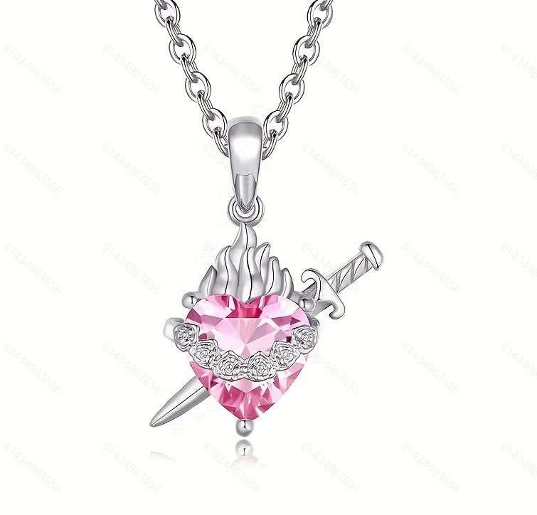 A red heart-shaped cross heart necklace with a chain