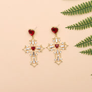 Gold Cross Earrings with Creative Heart Design