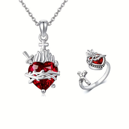 A red heart-shaped cross heart necklace with a chain