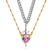 A red heart-shaped cross heart necklace with a chain