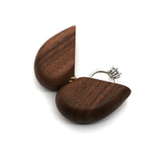 Black walnut wood ring box in the shape of a heart
