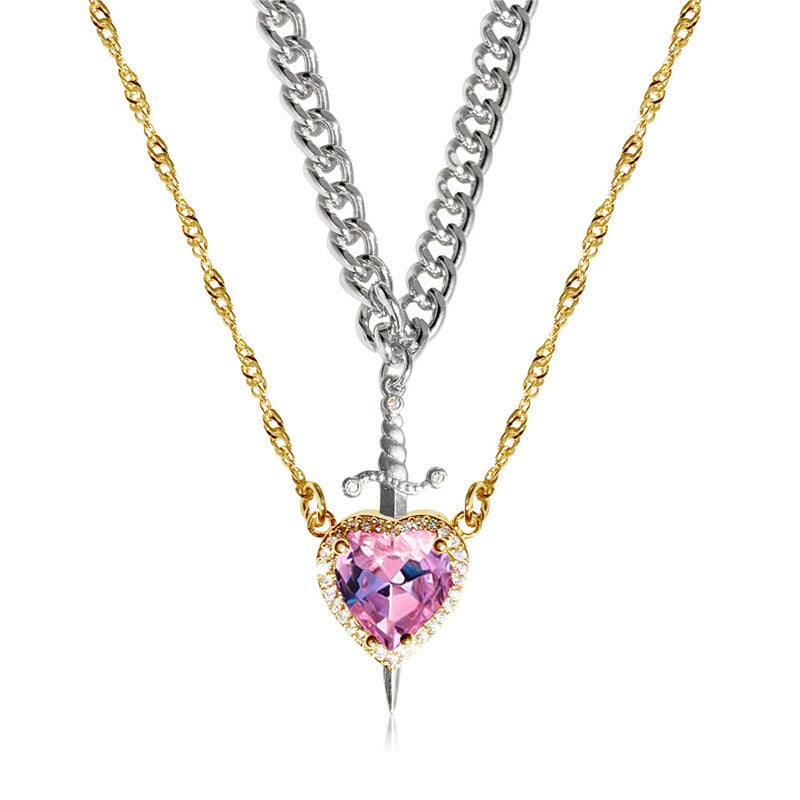 A red heart-shaped cross heart necklace with a chain