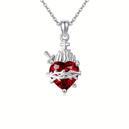 A red heart-shaped cross heart necklace with a chain