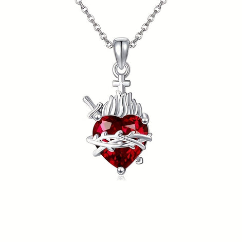 A red heart-shaped cross heart necklace with a chain