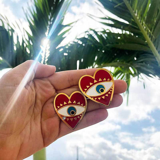Exaggerated Heart Earrings with Retro Eye Design