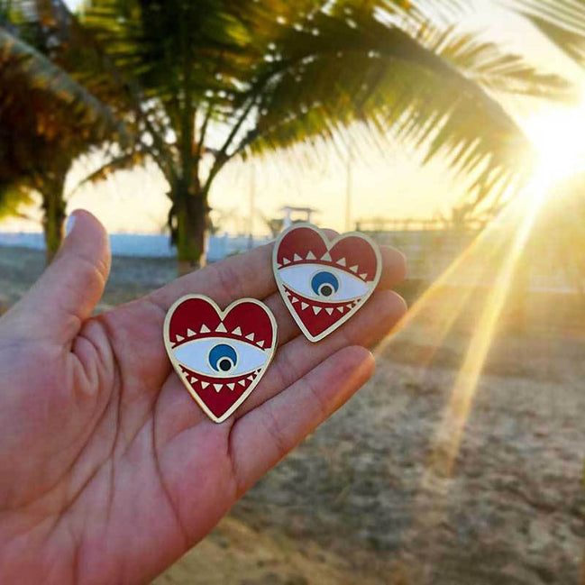 Exaggerated Heart Earrings with Retro Eye Design
